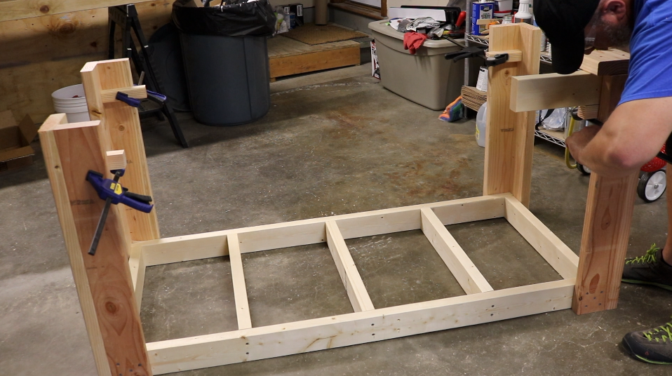 Use some scraps and clamps to accurately align the frame with the legs.