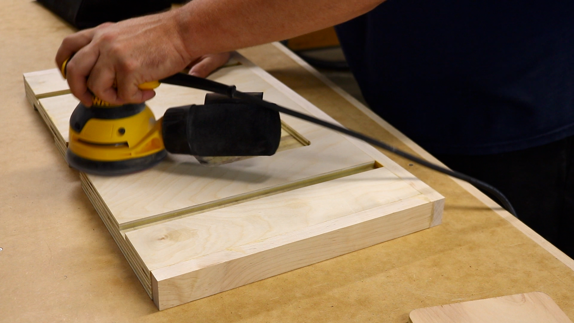 Sanding down the table